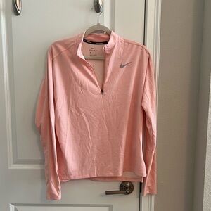 Light pink Nike dry fit pull over.
